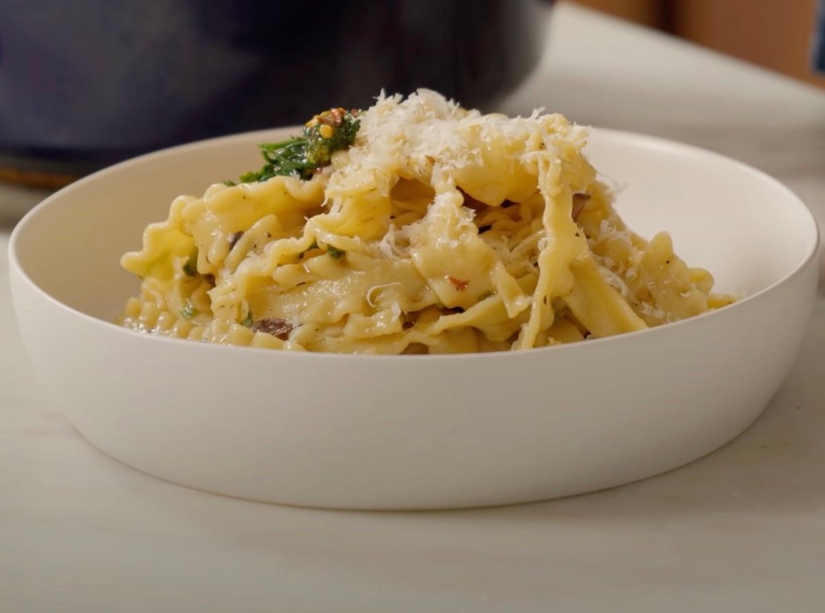 noodles with mushrooms and baby greens